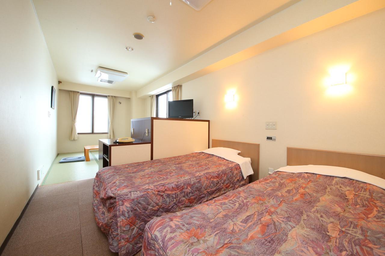 田川酒店 山之內 外观 照片
