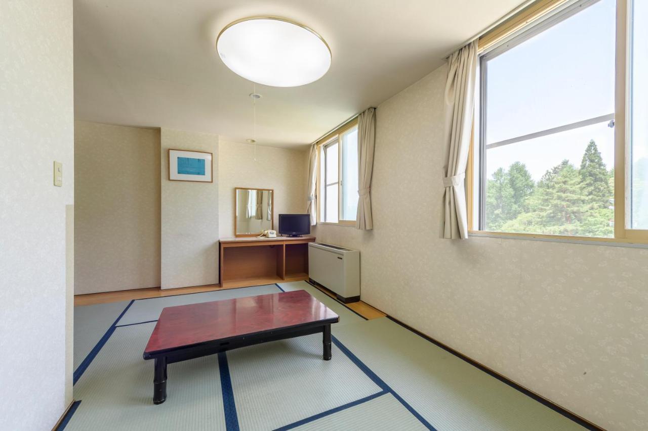 田川酒店 山之內 外观 照片