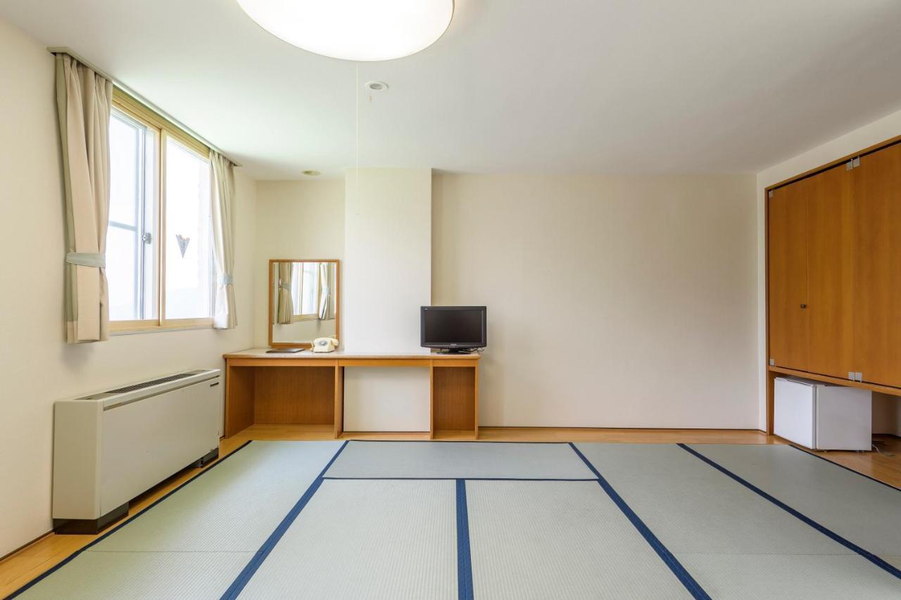 田川酒店 山之內 外观 照片