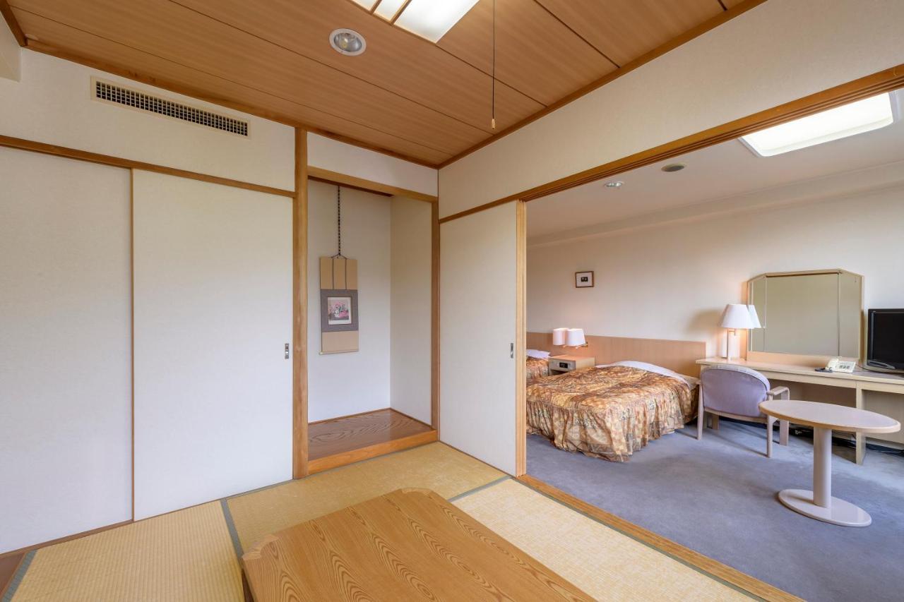 田川酒店 山之內 外观 照片